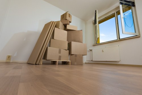 Furniture and boxes being loaded for a flat removal in Sipson