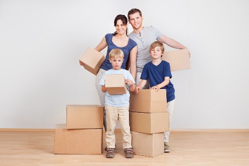 Furniture and boxes ready for a removals service in Sipson