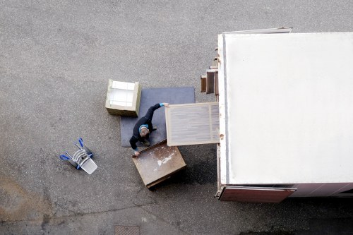 Man with van team loading items safely in Sipson