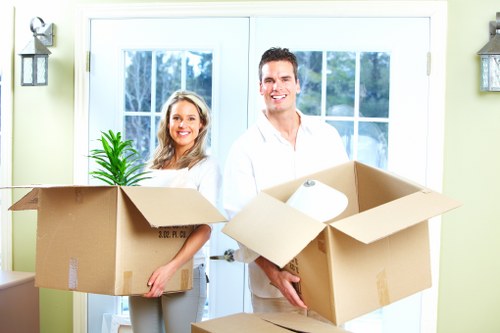 Team member handling household goods with care during a move