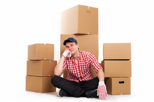 Loading furniture into a moving van in Sipson